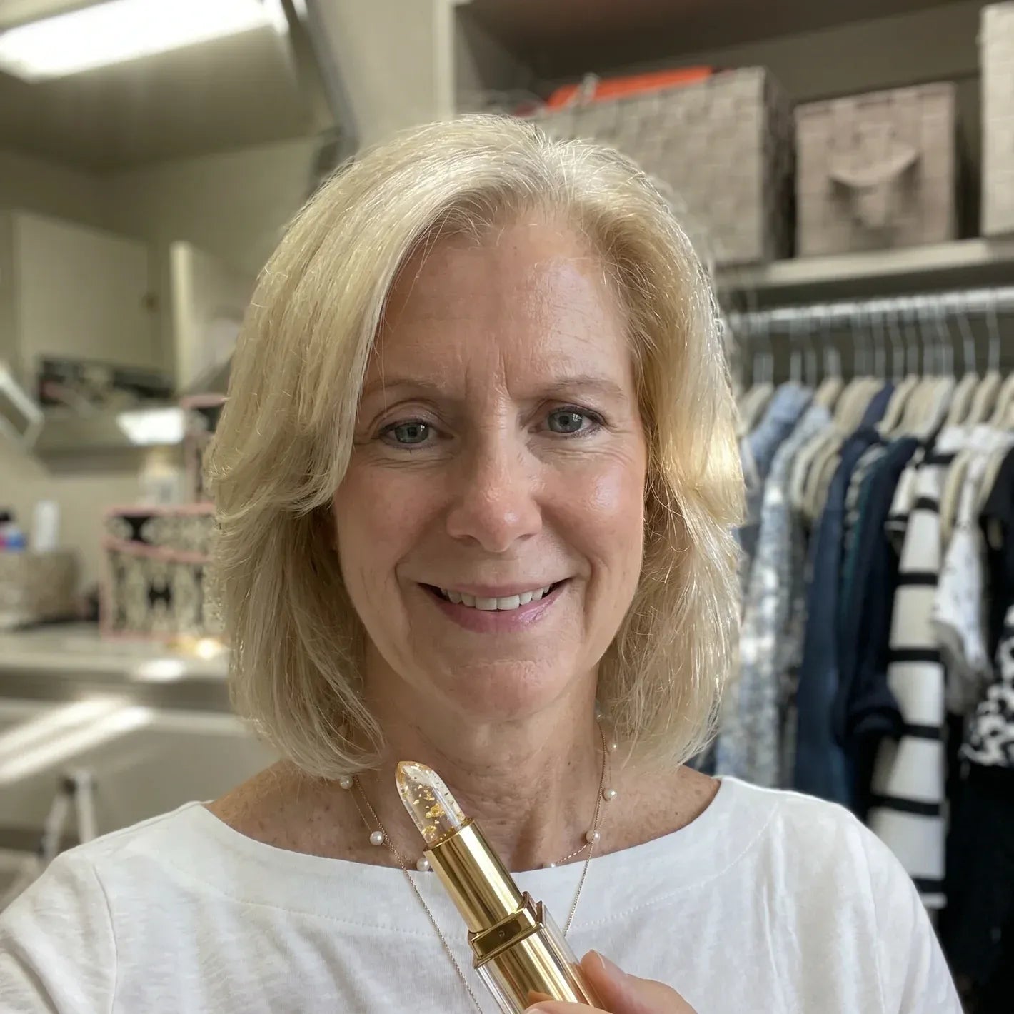Customer holding the lipstick