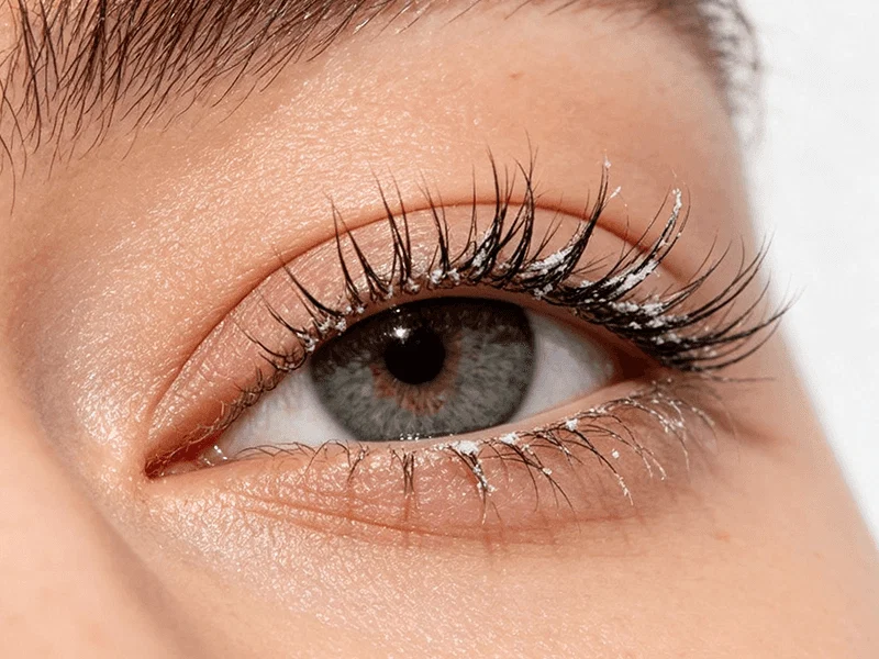 Messy lash glue on eyelashes
